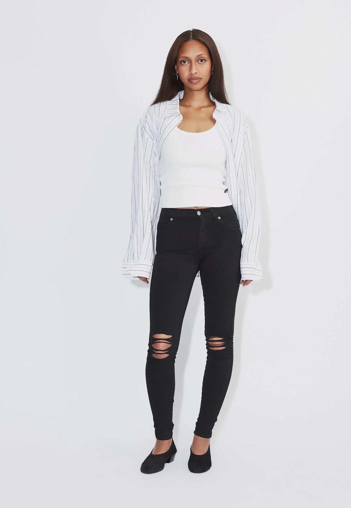 1510111A03_DrDenim_LexyMidSkinny_BlackRippedKnees_Main_W1_2