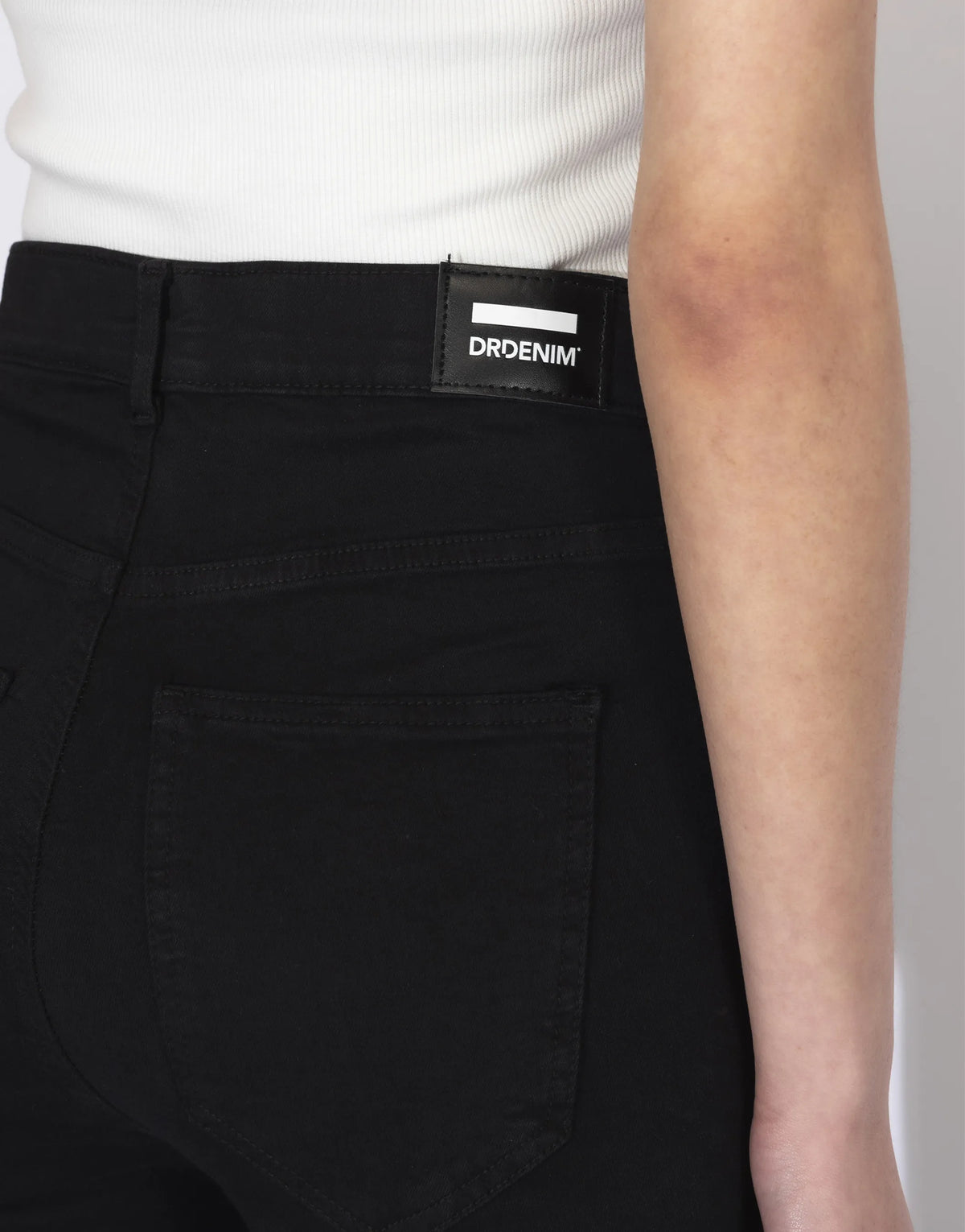 1510112A03_DrDenim_MoxyHighSkinny_BlackRippedKnees_Main_W5_2