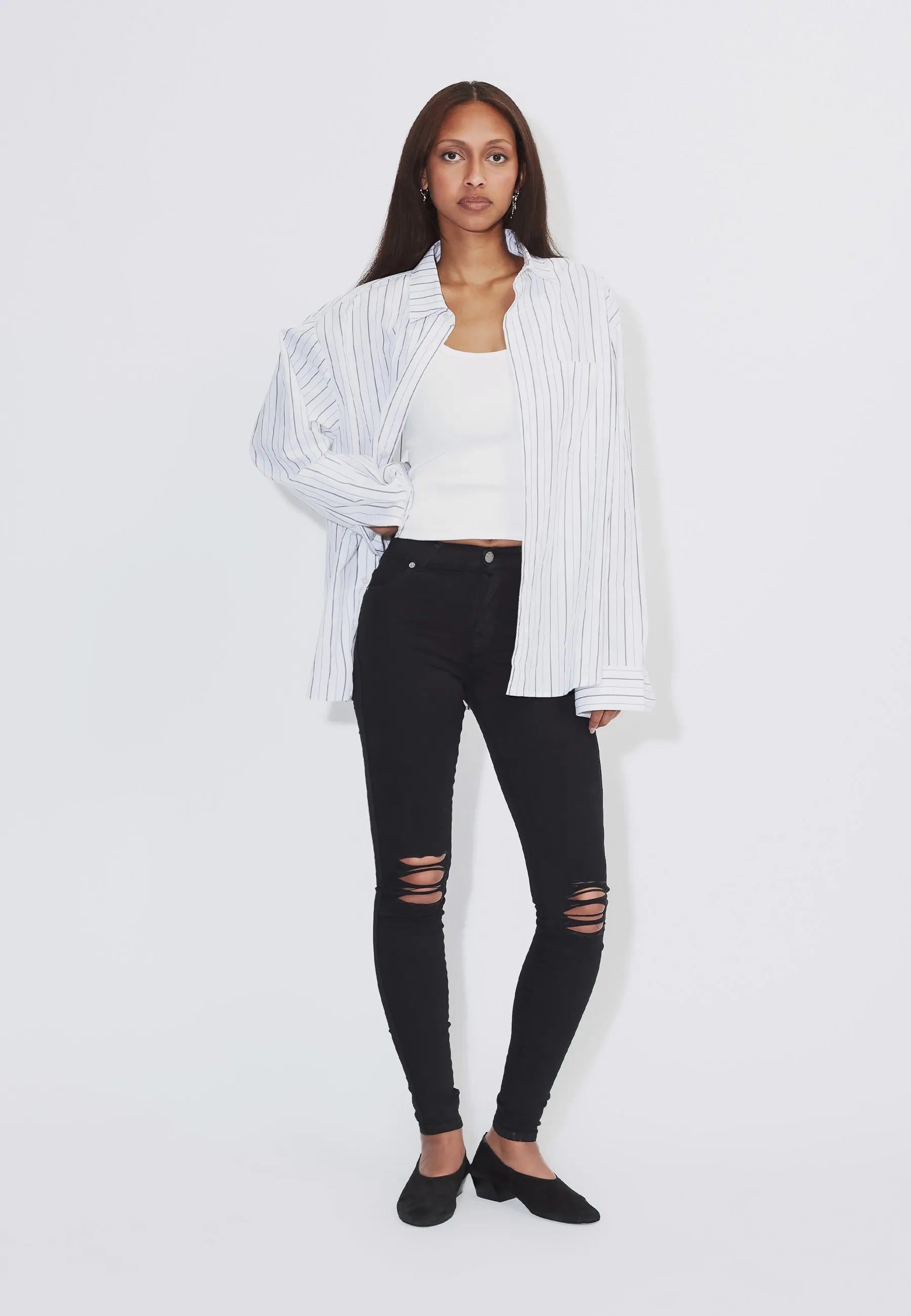1510111A03_DrDenim_LexyMidSkinny_BlackRippedKnees_Main_W1_1