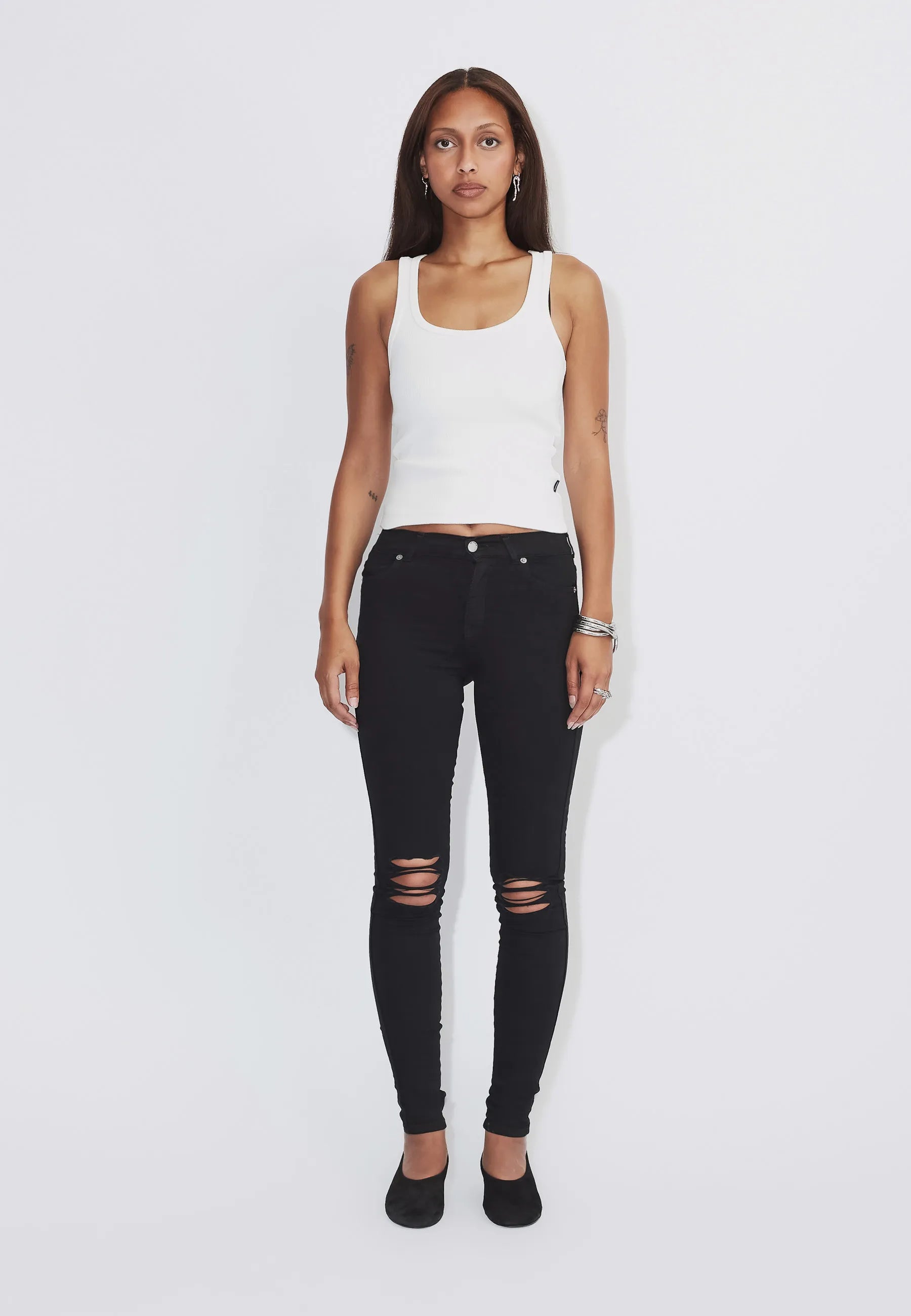 1510111A03_DrDenim_LexyMidSkinny_BlackRippedKnees_Main_W1_3