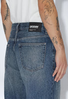 2430107M37_DrDenim_RiftWideBootcut_StreamMidFadeDirt_main_M5_2